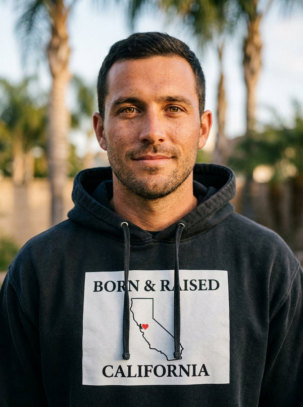 Man wearing California Born and Raised Hoodie t-shirt in California backyard